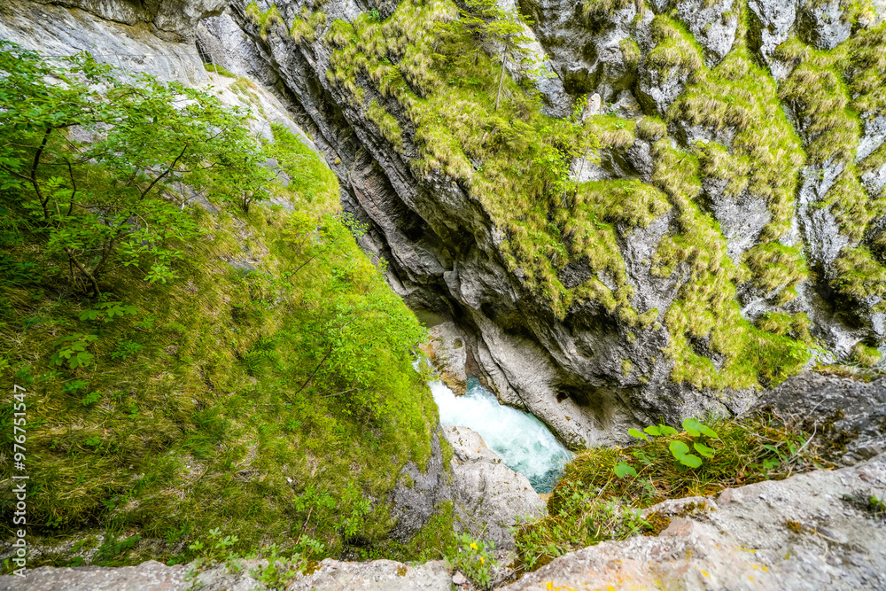 Nature in the Tiefenbachklamm between Kramsach and Brandenberg. Landscape with a river and rocks in the Alpbachtal.
Nature in the Tiefenbachklamm between Kramsach and Brandenberg. Landscape with a river and rocks in the Alpbachtal.