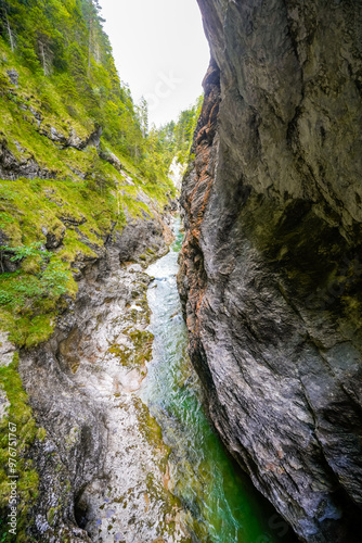 Nature in the Tiefenbachklamm between Kramsach and Brandenberg. Landscape with a river and rocks in the Alpbachtal. 