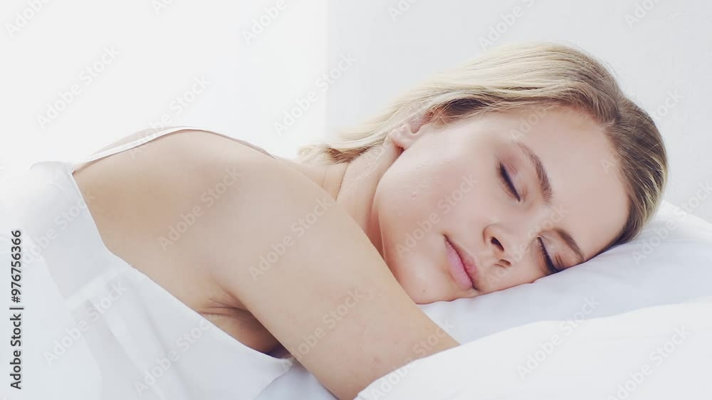 Peaceful, serene scene of a young woman sleeping comfortably in bed, with soft, natural lighting. Perfect for themes of relaxation, rest, and tranquility. Peaceful, serene scene of a young woman sleeping comfortably in bed, with soft, natural lighting. Perfect for themes of relaxation, rest, and tranquility.
