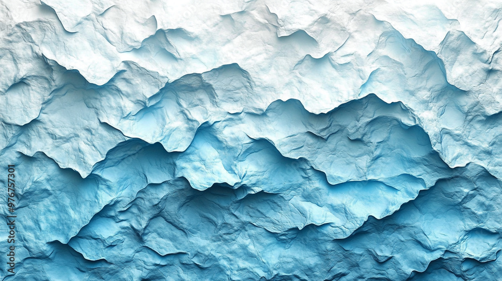 Obraz premium An abstract textured background featuring layered blue and white tones, resembling waves of paper and water.