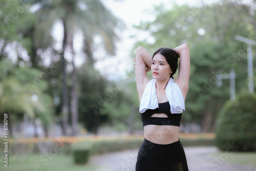  happy young man and woman jog together on a sunny morning in a city park, embracing a healthy, active lifestyle with fitness and outdoor exercise.