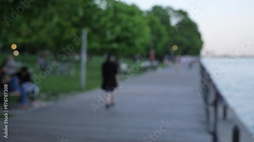 Wallpaper Mural blurred out evening lakeshore waterfront people taking a walk in twilight Torontodigital.ca