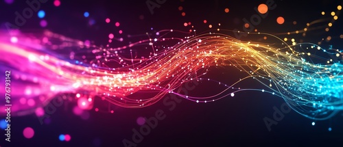 Vibrant, glowing light trails in a digital abstract background with multi-colored particles creating a dynamic and futuristic visual explosion.