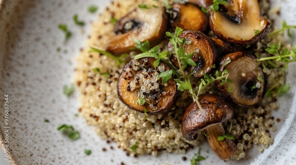 A gourmet dish featuring roasted shiitake mushrooms, garnished with fresh herbs and served alongside a bed of quinoa on an elegant, minimalist plate. A gourmet dish featuring roasted shiitake mushrooms, garnished with fresh herbs and served alongside a bed of quinoa on an elegant, minimalist plate.