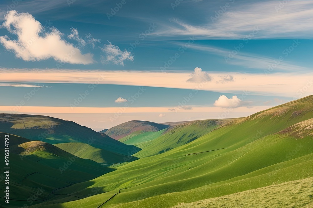 Fototapeta premium Emerald Valleys Under a Pastel Blue Sky with Serene Clouds and Gentle Breeze