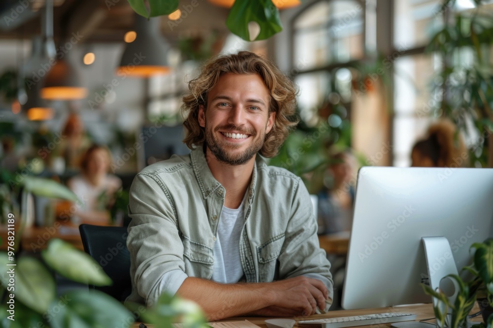 A man smiles while working at his desk. AI. A man smiles while working at his desk. AI.