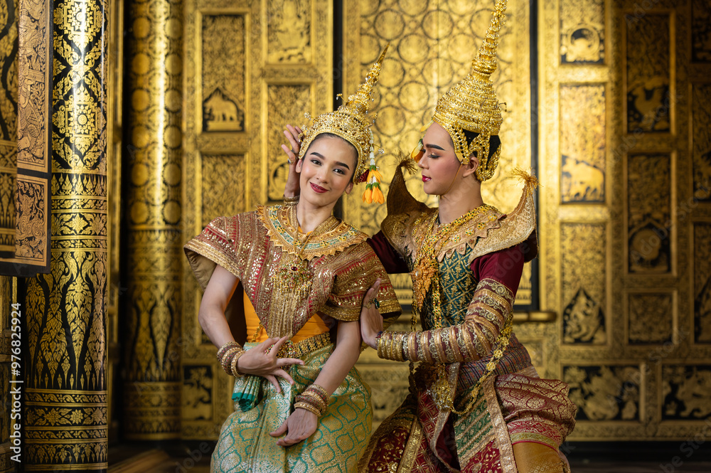 Obraz premium Pantomime (Khon) is traditional Thai classic masked play enacting scenes from the Ramayana with a backdrop of Thai paintings in a public place at Wat Phra Khao, Ayutthaya province, Thailand