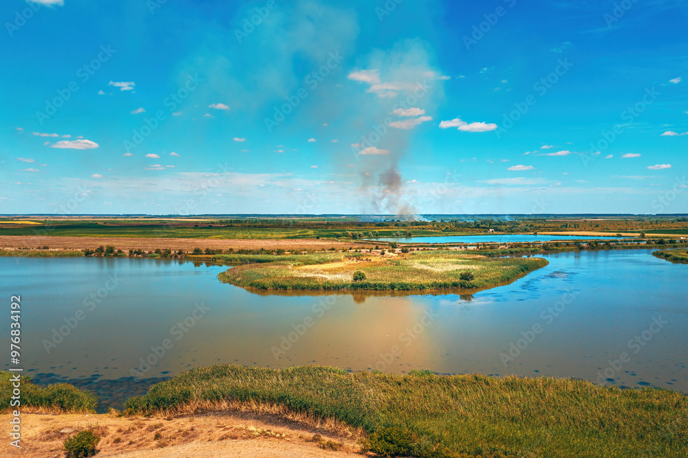 Aerial shot of wildfire in countryside landscape, drone pov Aerial shot of wildfire in countryside landscape, drone pov
