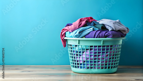 Colorful clothes in laundry basket with shades of blue, indigo, and purple , laundry, basket, colorful, clothes, blue