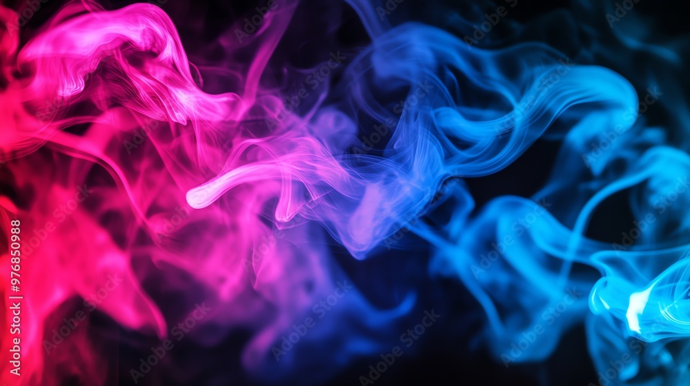 Abstract colorful smoke swirls on a black background. Abstract colorful smoke swirls on a black background.