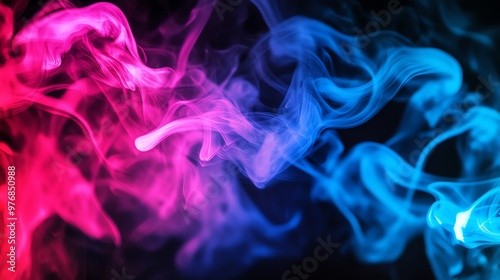 Abstract colorful smoke swirls on a black background.