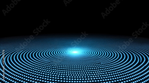 Illuminated blue circular patterns radiate from a central light source against a dark backdrop, creating a captivating visual effect