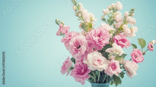 Wallpaper Mural Fresh pink bouquet of flowers, perfectly captured against a smooth, pastel blue background for a clean and modern look. Torontodigital.ca