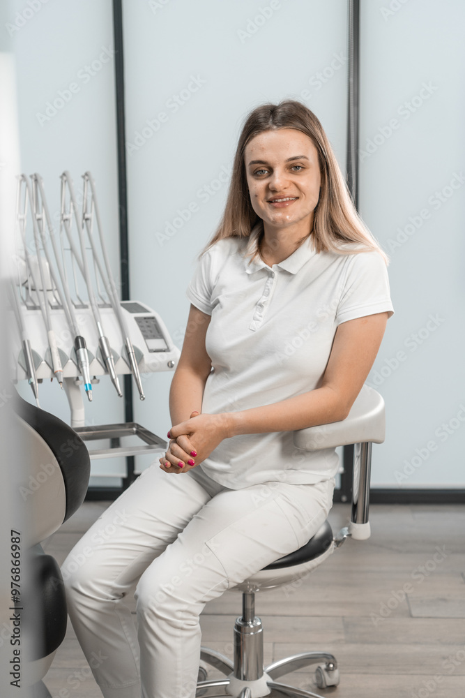 With an expression of relaxed care, the dentist strives to provide patients not only with highly qualified care, but also with a positive impression of the visit. With an expression of relaxed care, the dentist strives to provide patients not only with highly qualified care, but also with a positive impression of the visit.