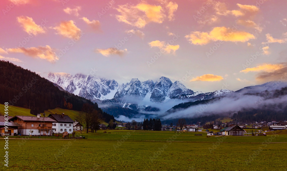 Naklejka premium Panoramic view of scenic Gosau village in the middle of Alps mountains in Austria.