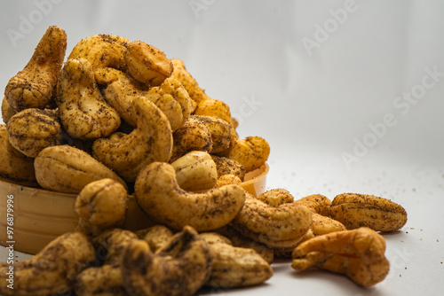 Masala Cashew Nuts, Roasted Kaju in Ghee Dry Fruits selective focused  photo