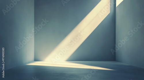 An empty room with a beam of light shining through a window.