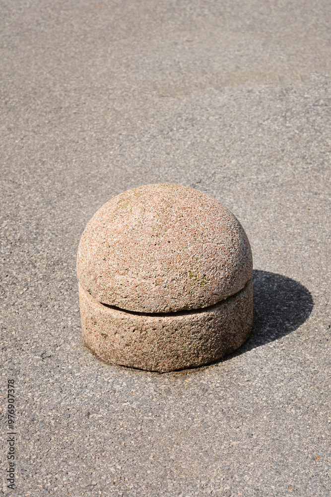 Obraz premium Concrete semicircular barrier preventing parking