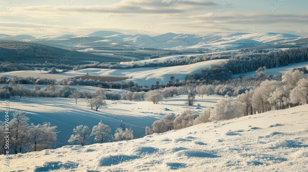 A snow-covered winter landscape featuring a scenic overlook of rolling hills and valleys blanketed in white A snow-covered winter landscape featuring a scenic overlook of rolling hills and valleys blanketed in white