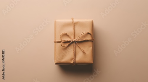 Minimalist Wrapped Gift Box on Beige Background