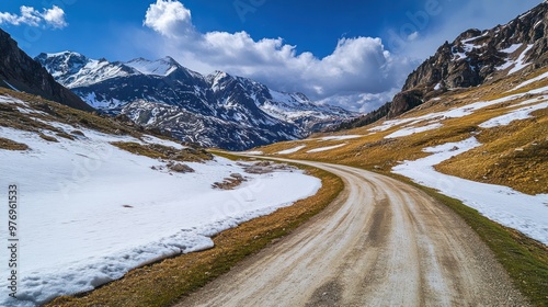 Winding Road Through Snowy Mountain Pass