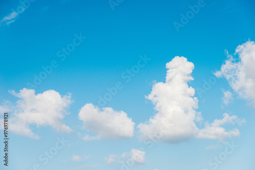 Blue sky background with white clouds