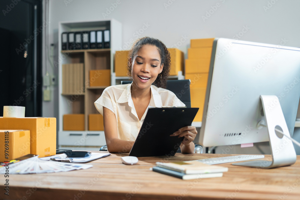 Woman start up online seller owner at workplace. small business entrepreneur SME or freelance asian woman working with box at home. Woman start up online seller owner at workplace. small business entrepreneur SME or freelance asian woman working with box at home.