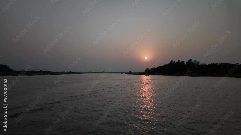 Fishing boats in the sunset in Sundarbans, Khulna Division, Dacope, Bangladesh