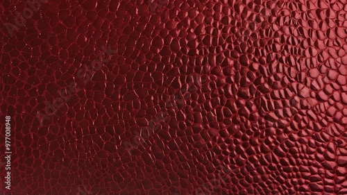 This image showcases a red leather material with a fine texture, ideal for fashion or design elements requiring a rich feel.