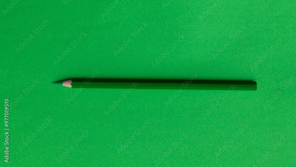 Green color pencil on green background Green color pencil on green background