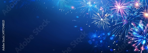Colorful fireworks on the blue background with a place for text