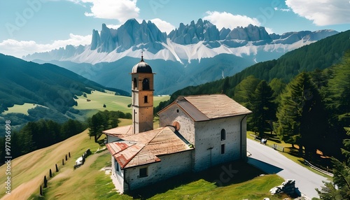 Aerial view of Ranui Chiesetta church amidst the stunning Dolomites in Italy photo