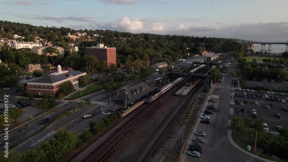 Amtrak train passing through Tarrytown Station on the Hudson Line, Metro North. 4K aerial shot Amtrak train passing through Tarrytown Station on the Hudson Line, Metro North. 4K aerial shot