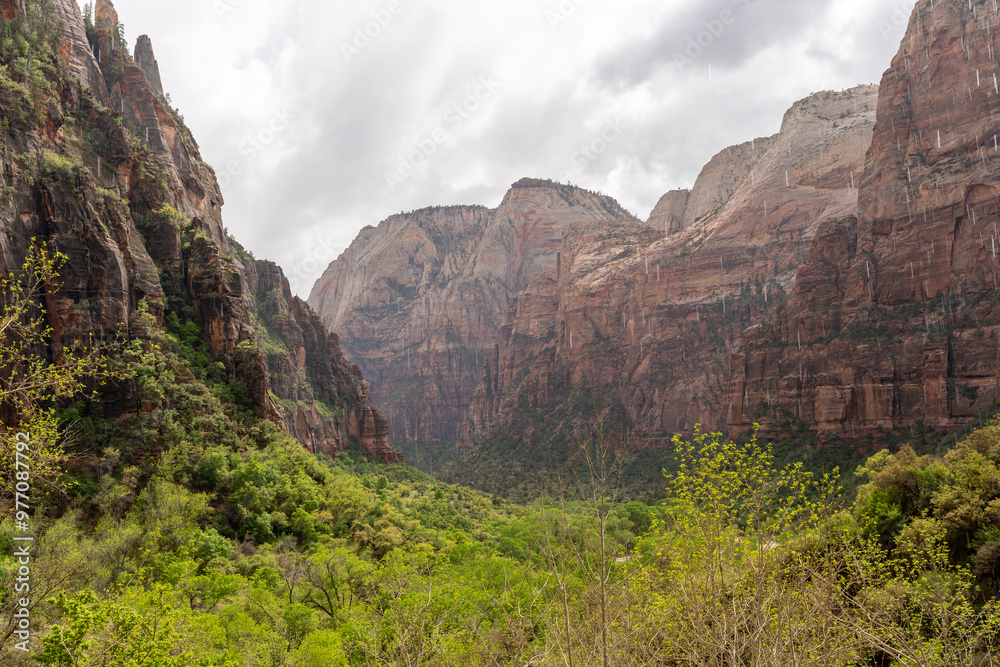 A stunning view of red rocks on a cloudy day at Zion National Park, Utah. A stunning view of red rocks on a cloudy day at Zion National Park, Utah.