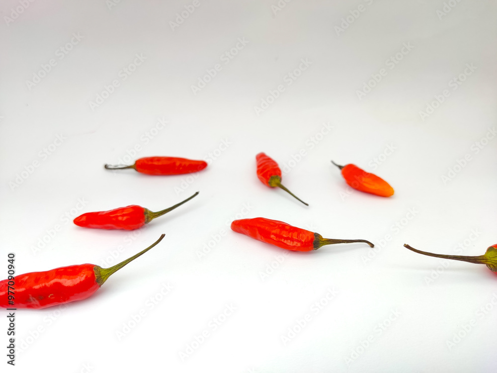 Ripe red chili pepper on isolated white background. Ripe red chili pepper on isolated white background.