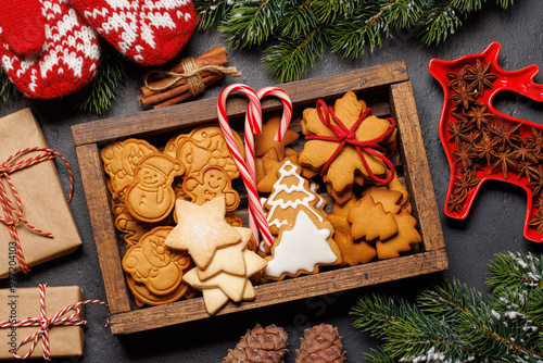 Gingerbread cookies and fir tree branch photo