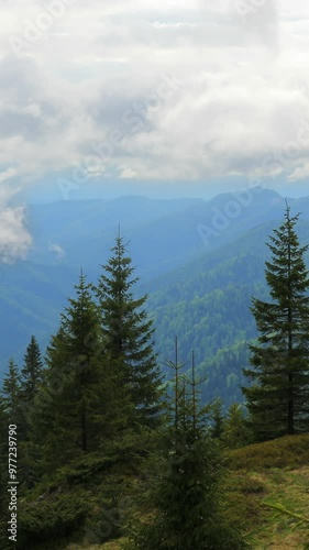 Wallpaper Mural Scenic Mountain View with Clouds Moving Across the Peaks Torontodigital.ca