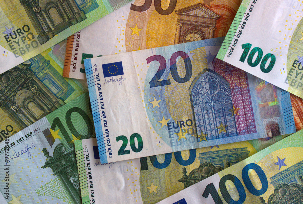Euro money and coins close-up. The national currency of the European Union Euro money and coins close-up. The national currency of the European Union