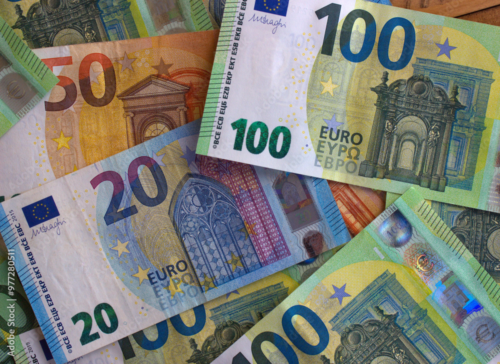 Euro money and coins close-up. The national currency of the European Union Euro money and coins close-up. The national currency of the European Union