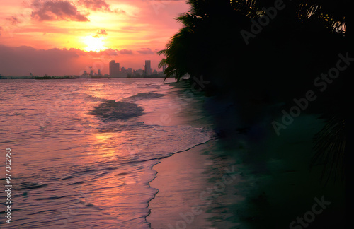 Historic view of Singapore skyline at sunset from the old Katong Beach in Singapore approx late 1970s before reclamation