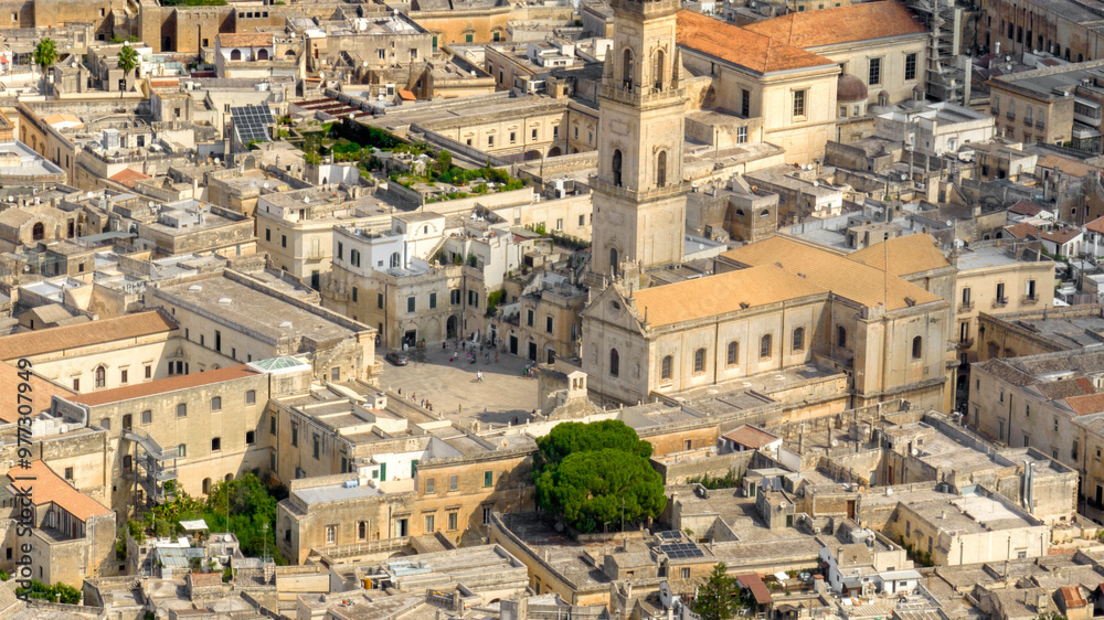 Naklejka premium Aerial view of the cathedral of Lecce, in Apulia, Italy. The metropolitan cathedral of Santa Maria Assunta with its tall bell tower is located in Piazza del Duomo, in the historic center of the city.