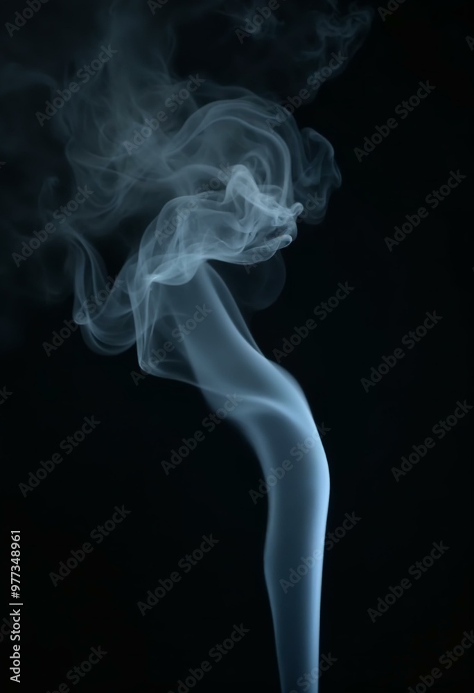 Fototapeta premium Swirling smoke against dark background