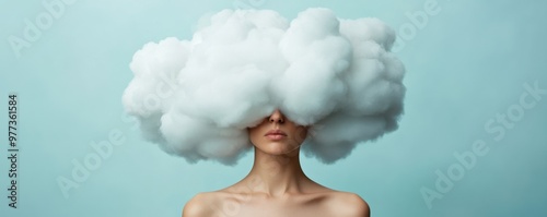 Surreal image of a woman with a cloud for a head, representing creativity and dreaminess against a soft blue background.