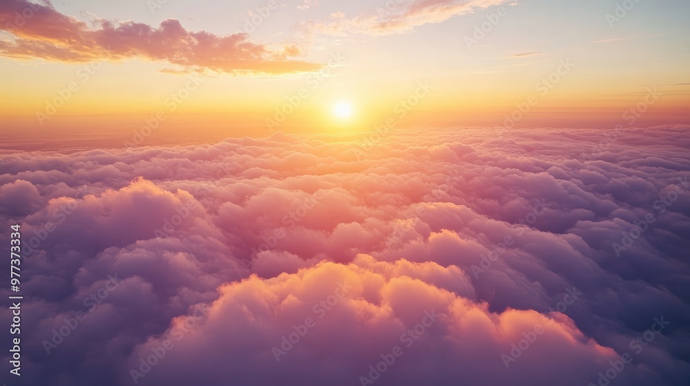 Aerial view from an airplane, flying over thick clouds during a sunrise, with warm orange and pink hues illuminating the horizon Aerial view from an airplane, flying over thick clouds during a sunrise, with warm orange and pink hues illuminating the horizon