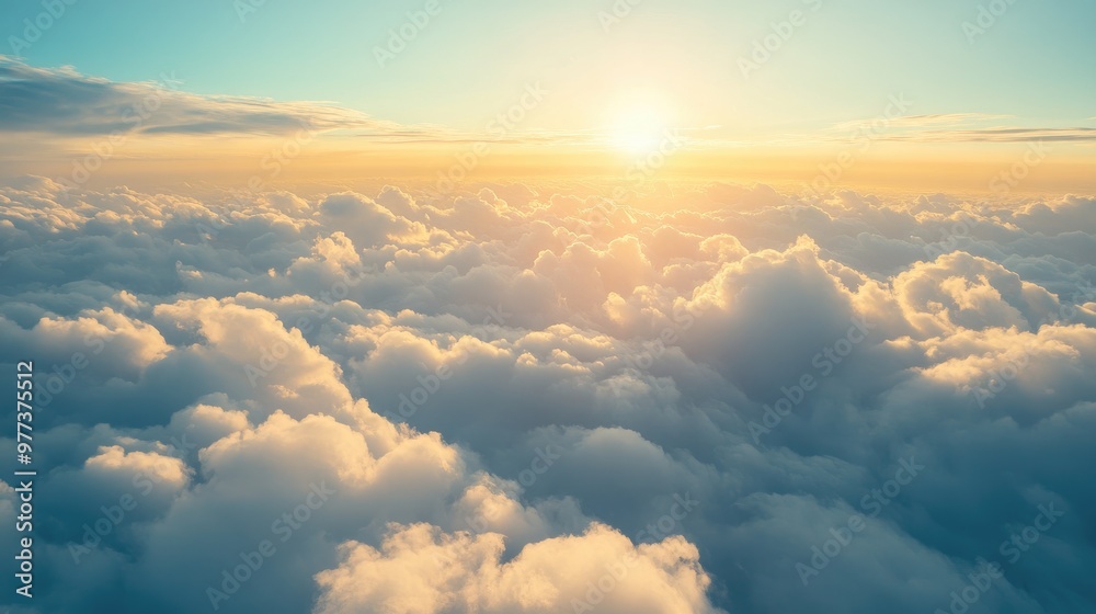 A stunning aerial view of fluffy clouds from an airplane window, with a peaceful blue sky and the golden glow of the setting sun A stunning aerial view of fluffy clouds from an airplane window, with a peaceful blue sky and the golden glow of the setting sun