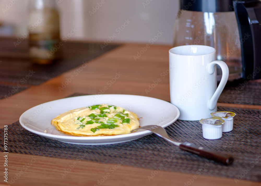 Omelette with Green Onions and Coffee for Breakfast Omelette with Green Onions and Coffee for Breakfast