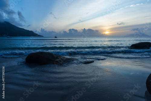 Beau Vallon beach landscape at night, blue shore water photo