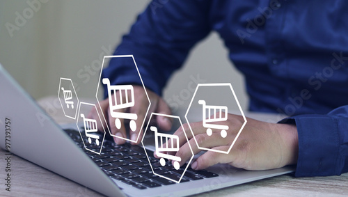 Business ecommerce concept, Person touching online shopping cart icon on virtual screen. online purchase, ecommerce store, online business, shopping on the internet.