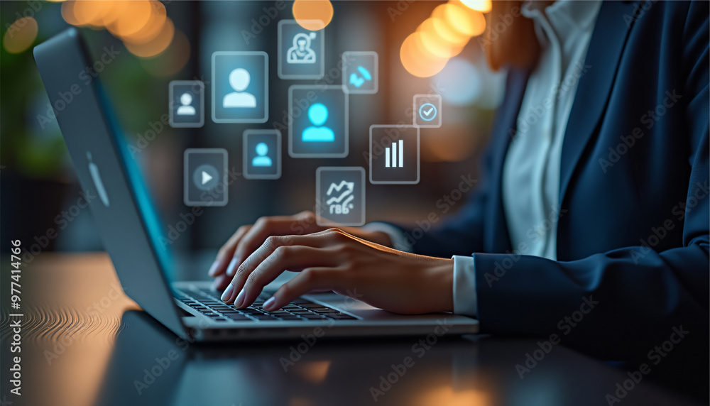 a business professional using a laptop and digital tablet with marketing virtual icons displayed a business professional using a laptop and digital tablet with marketing virtual icons displayed