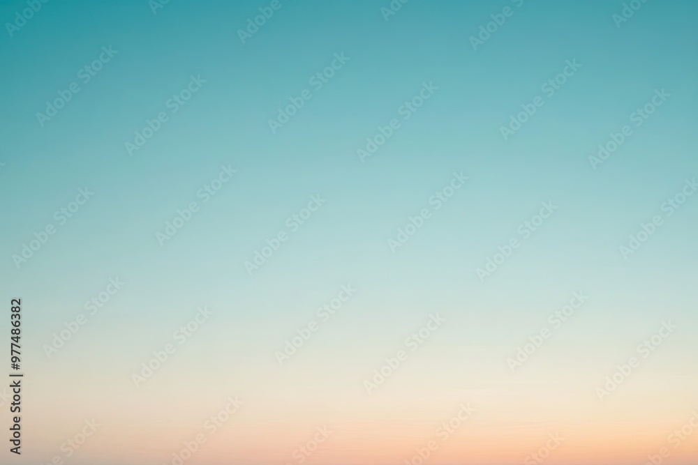 Naklejka premium A serene gradient sky blending soft blue and warm peach hues, perfect for creating a calm and peaceful atmosphere.